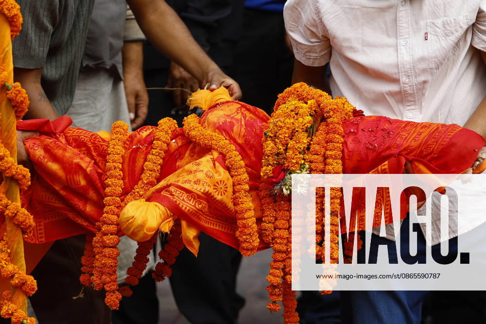 A symbolic effigy representing Suraj Timilsina, 32, made of straw and barley grains, is prepared for his final rites after his body could not be recovered following the devastating floods, at Pashupatinath Temple in Kathmandu, Nepal, on Wednesday, September 2, 2026. Suraj, originally from Sindhupalchok, was involved in an import-export and transport business in Timure, Rasuwa, and was swept away by the floods. He is survived by his wife, Ayusha Timilsina, 27, and their six-year-old son and three-year-old daughter. As thousands remain missing and many bodies have yet to be recovered, families have begun performing final rites for loved ones without their remains. The floods have killed more than 1,000 peo - ZUMAg200 20260902_zap_g200_003