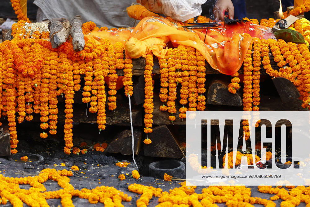 A symbolic effigy representing Suraj Timilsina, 32, made of straw and barley grains, is prepared for his final rites after his body could not be recovered following the devastating floods, at Pashupatinath Temple in Kathmandu, Nepal, on Wednesday, September 2, 2026. Suraj, originally from Sindhupalchok, was involved in an import-export and transport business in Timure, Rasuwa, and was swept away by the floods. He is survived by his wife, Ayusha Timilsina, 27, and their six-year-old son and three-year-old daughter. As thousands remain missing and many bodies have yet to be recovered, families have begun performing final rites for loved ones without their remains. The floods have killed more than 1,000 peo - ZUMAg200 20260902_zap_g200_005
