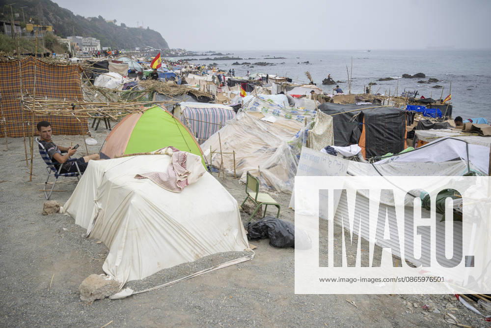 The Government Takes Control of the Port of Ceuta to Provide Humanitarian Assistance to Migrants Several migrants camped on the beach, September 5, 2026, in Ceuta, Spain. The government is taking control of the port of Ceuta to provide humanitarian assistance to migrants in tents and other spaces, as provided for in a resolution from the Ministry of Transportation and Sustainable Mobility published this Saturday and reviewed by Europa Press. Specifically, the department led by Óscar Puente authorizes the Secretary of State for Migration to temporarily use an area of 16,000 square meters of public port land located in the Poniente Expansion, Phase I, of the port of Ceuta’s service area SEPTEMBER 5, 2026 MIGRANTS IMMIGRATION HUMANITARIAN CRI