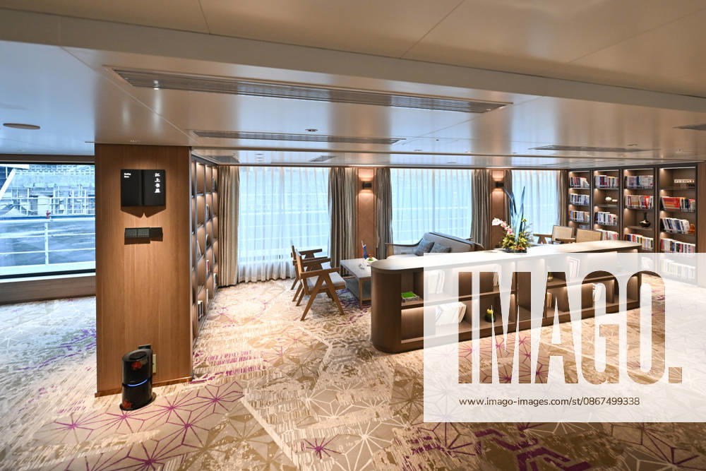 A general view shows the riverside library inside the new cruise ship Century Vision on September 21, 2026 in Chongqing, China. The 15,000-ton vessel, measuring 149.99 meters in length with 236 guest rooms, has been deployed on the Chongqing-Yichang route along the Three Gorges of the Yangtze River.
