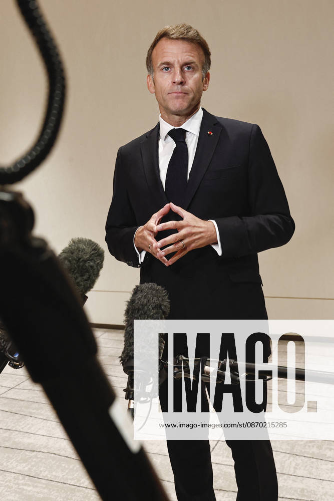 President Macron At The Opswf Summit During His Visit To Qatar French President Emmanuel Macron gestures as he speaks to members of the media on the day of the 9th Annual One Planet Sovereign Wealth Funds (OPSWF) Summit, in Lusail, Qatar, October 21, 2026. Photo by Benoit Tessier Pool ABACAPRESS.COM Lusail Qatar