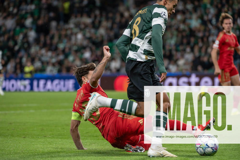 Sporting CP midfielder JOAO SIMOES takes the ball past a sliding challenge from a LASK player during their UEFA Champions League league phase matchday three match at Estadio Jose Alvalade in Lisbon, Portugal, on October 21, 2026. Lisbon Portugal - ZUMAr238 20261021_zip_r238_026