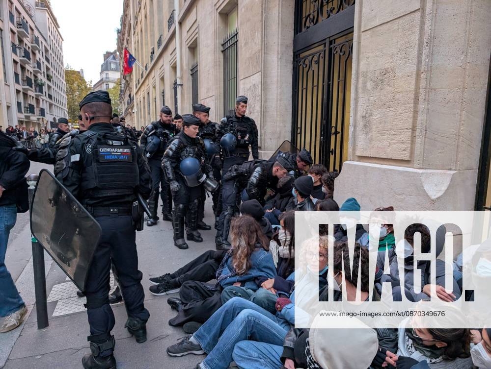 Students stage sit-in protest at Sciences Po Paris PARIS, FRANCE - OCTOBER 22: French gendarmerie officers intervene as students stage a sit-in protest outside Sciences Po Paris in Paris, France, on October 22, 2026. Students remain seated on the sidewalk as officers approach and attempt to remove protesters from the area. Luc Auffret Anadolu Paris France. Editorial use only. Please get in touch for any other usage.