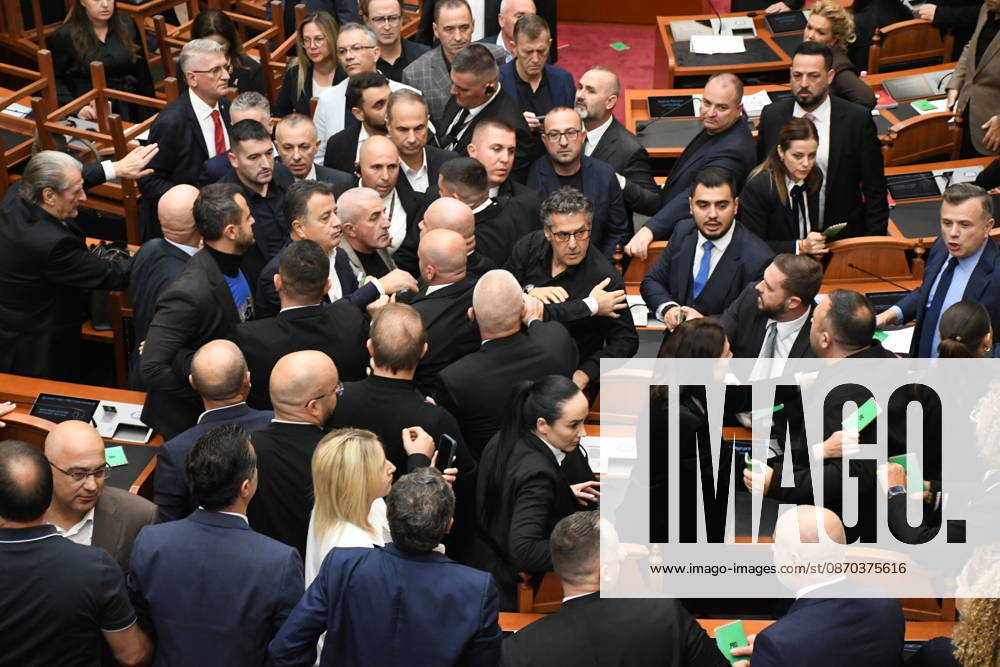 Opposition MPs stack chairs to disrupt parliamentary session in Tirana TIRANA, ALBANIA - OCTOBER 22: Heated arguments and scuffles break out during a protest in which opposition lawmakers stacked chairs on desks to block a plenary session at the Albanian Parliament in Tirana, Albania, on October 22, 2026. Tensions flared in the assembly chamber after demands by opposition MPs to debate the ongoing ten-day student demonstrations were rejected by parliamentary leadership. Olsi Shehu Anadolu Tirana Albania. Editorial use only. Please get in touch for any other usage.