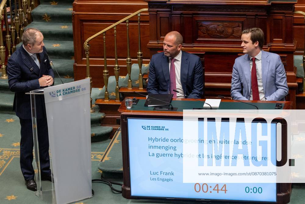 Les Engages Luc Frank; Minister of Defence and Foreign Trade Theo Francken and N-VA s Jeroen Bergers pictured during a plenary session of the Chamber at the federal parliament in Brussels, Thursday 22 October 2026. NICOLASxMAETERLINCK 190657286