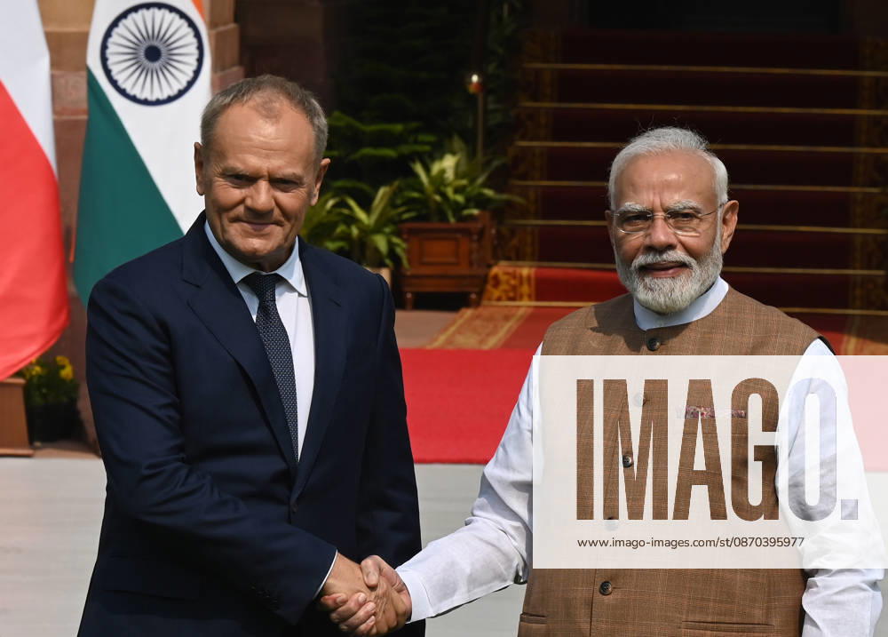 Prime Minister Narendra Modi (R) welcomes Prime Minister of Poland, Donald Tusk (L), prior to their delegation-level bilateral meeting and joint press statement at Hyderabad House on October 22, 2026 in New Delhi, India. The high-level meeting marked Polish Prime Minister Tusk s official visit to India from October 21-23, 2026 his first visit to the country as Prime Minister since 2010 aimed at advancing the India-Poland Strategic Partnership and deepening India-EU strategic ties. During wide-ranging discussions, both leaders reviewed bilateral cooperation across key sectors including trade, technology, defense-industrial collaboration, and energy, while reaffirming joint commitment toward peaceful diplomatic