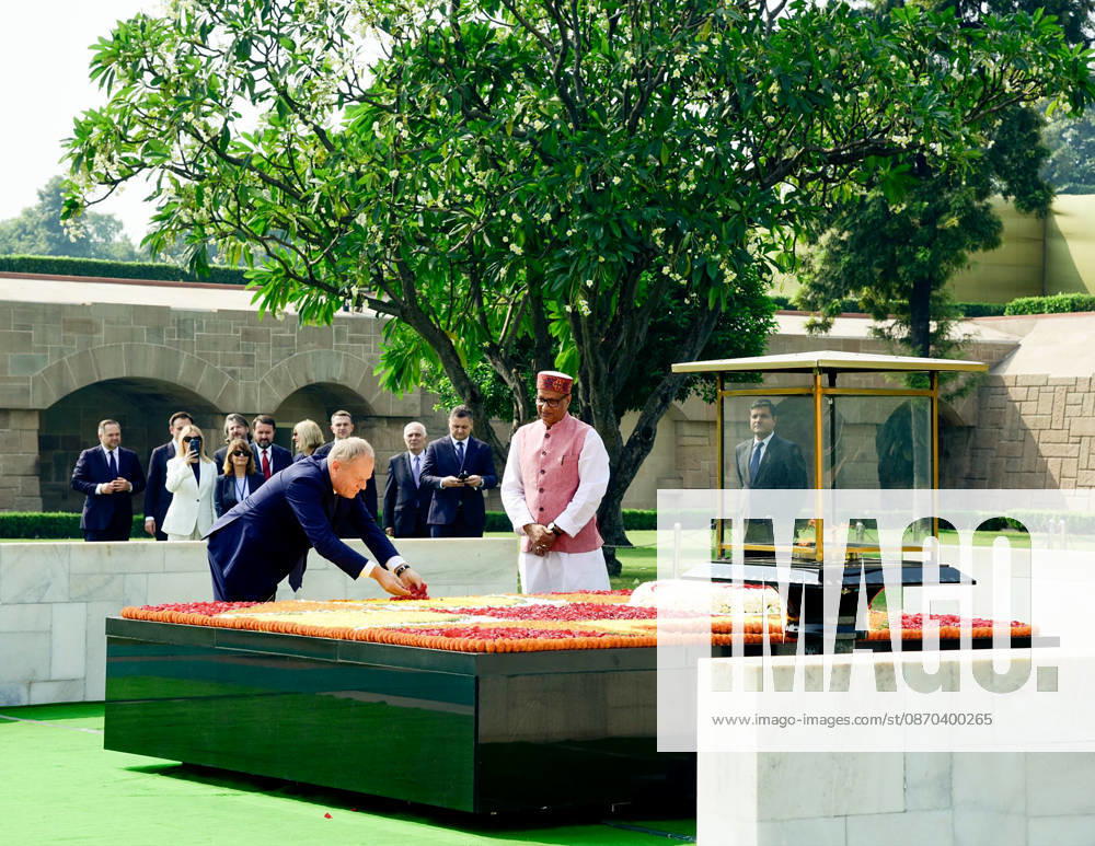 Poland PM Donald Tusk in India New Delhi, Oct 22 (ANI): Poland PM Donald Tusk pays a floral tribute to Mahatma Gandhi at Raj Ghat, in New Delhi on Thursday. (@MEAIndia X ANI Photo) NEW DELHI Delhi India