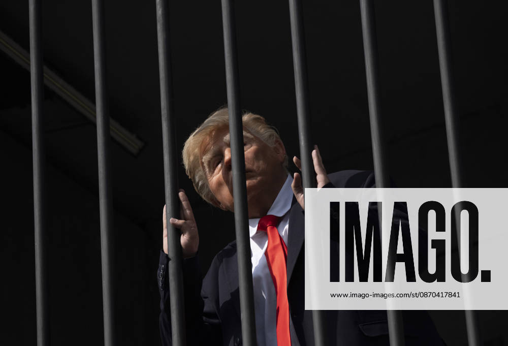 Anti-U.S. President Trump Performance On Billboard Reactions An Iranian masked man performs as U.S. President Donald Trump inside a symbolic cell mounted on a billboard in northern Tehran, Iran, on October 22, 2026, amid escalating tensions between Iran and the United States. Tehran Tehran Iran