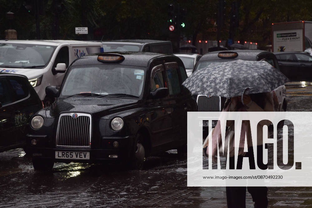 Taxis and cars pass through a waterlogged Euston Road as Storm Austen brings rain to the capital. London United Kingdom - ZUMAv130 20261023_zip_v130_001