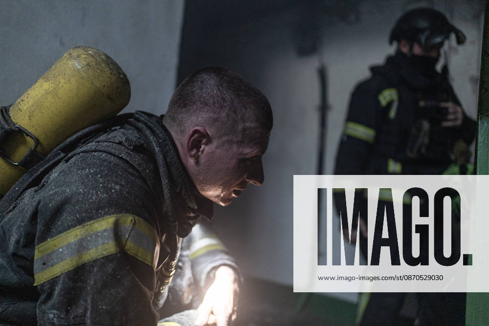 Russian drone attack on a residential building in Kramatorsk KRAMATORSK, UKRAINE - OCTOBER 23: An exhausted firefighter after putting out a fire caused by an attack by a Russian FPV drone in Kramatorsk, Ukraine, 23 October 2026 Diego Herrera Carcedo Anadolu Kramatorsk Ukraine. Editorial use only. Please get in touch for any other usage.