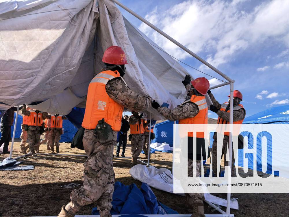 (261024) -- NAGQU, Oct. 24, 2026 -- Members of the People s Armed Police Force Xizang Corps set up a temporary tent at a quake-hit village in Maru Township of Baqen County, Nagqu City, southwest China s Xizang Autonomous Region, Oct. 23, 2026. Sixteen people have been killed and 76 others are injured following a 7.0-magnitude earthquake that struck Baqen County of the city of Nagqu in southwest China s Xizang Autonomous Region at 10:33 p.m. on Thursday, local authorities said. (Photo by Xinhua) (SpotNews) CHINA-XIZANG-NAGQU-EARTHQUAKE-RESCUE (CN) WangxXingquan