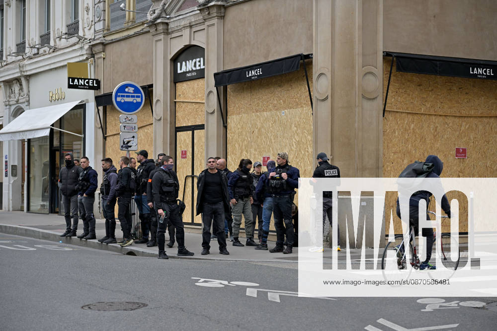 Shops Boarded Up With Wooden Panels - Lyon Police protection while shops in Lyon are boarded up with wooden panels ahead the Yellow Vests Protest Act II In Lyon, France on October 24, 2026. Photo by ABACAPRESS.COM Lyon France