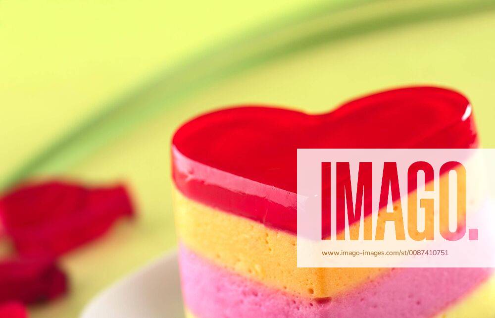 Colorful Peruvian heart-shaped jelly-pudding cake called Torta Helada (Very Shallow Depth of Field, Focus on the tip of the cake)