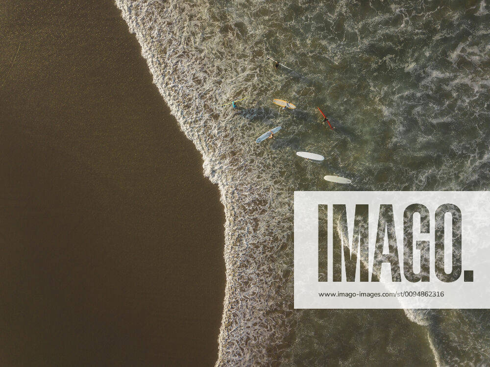 Aerial view of surfers at the beach Indonesia, Bali CR_KOTRIN191014C-220187-01