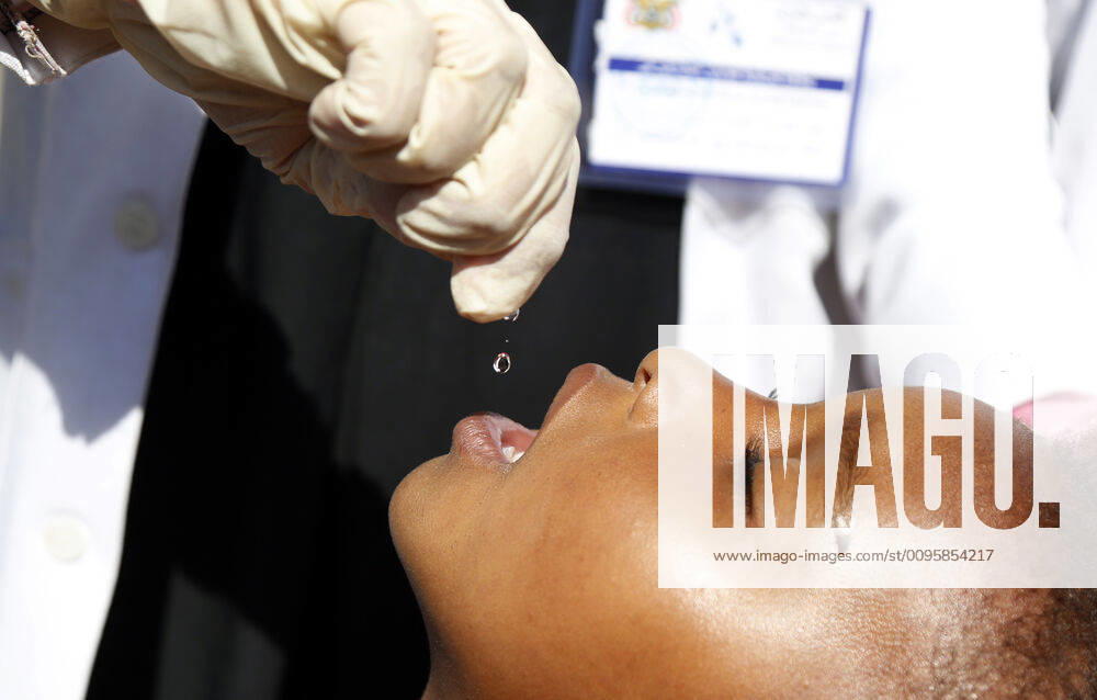(191224) -- YEMEN, Dec. 24, 2019 (Xinhua) -- A child receives a vaccine against polio during an immunization campaign against polio in Sanaa, Yemen, Dec. 24, 2019. Yemen s health authorities on Monday launched a national polio immunization campaign targeting over 5.5 million children. Supported by the World Health Organization (WHO) and the United Nations Children s Fund (UNICEF), the campaign was inaugurated simultaneously in the Yemeni capital Sanaa and other provinces. The three-day vaccination process went from house to house to immunize children under the age of five. (Photo by Mohammed Mohammed Xinhua) YEMEN-SANAA-POLIO IMMUNIZATION CAMPAIGN