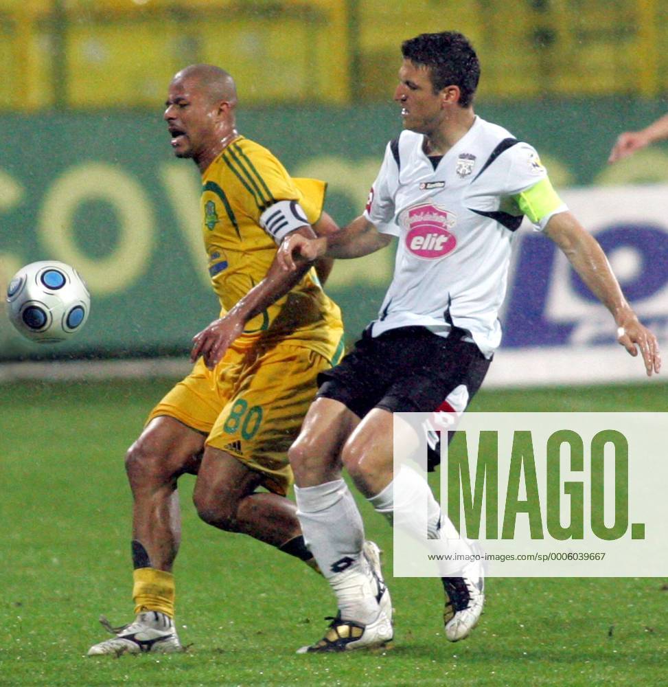 Lopes Da Silva Wesley(L) - FC Vaslui and Razvan Dalbea(r) - Unirea Alba  Iulia