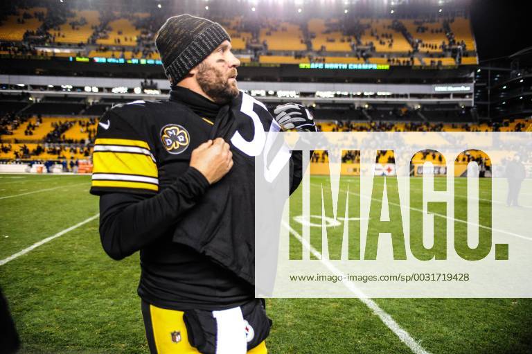 Pittsburgh Steelers quarterback Ben Roethlisberger (7) walks off the field  holding the jersey of linebacker Ryan Shazier after beating the Baltimore  Ravens 39-38 to clinch the AFC North Championship in an NFL