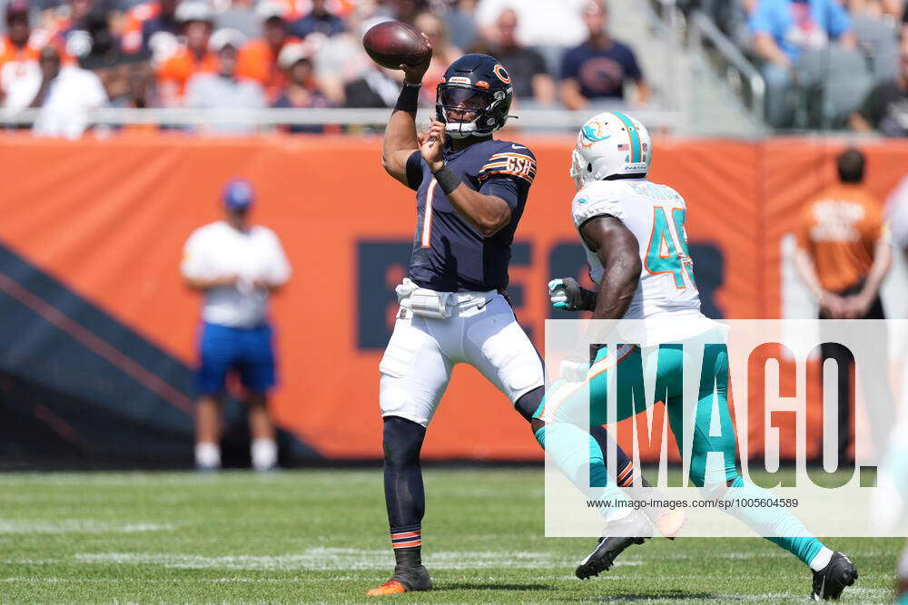 CHICAGO, IL - AUGUST 14: Chicago Bears quarterback Justin Fields (1) throws  the football during a pre-season game between the Chicago Bears and the  Miami Dolphins on August 14, 2021 at Soldir