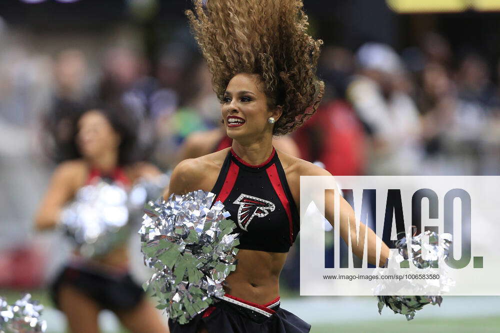 ATLANTA, GA - SEPTEMBER 12: A Falcons cheerleader performs during