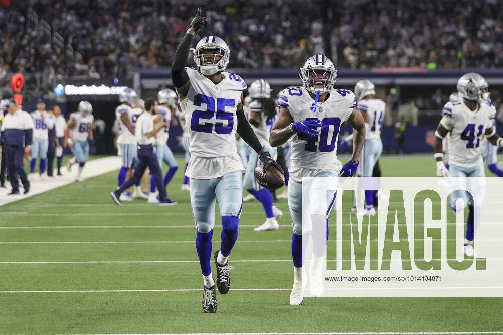 ARLINGTON, TX - AUGUST 26: Dallas Cowboys cornerback Nahshon Wright (25)  runs back for yardage after an interception during the game between the  Dallas Cowboys and the Seattle Seahawks on August 26