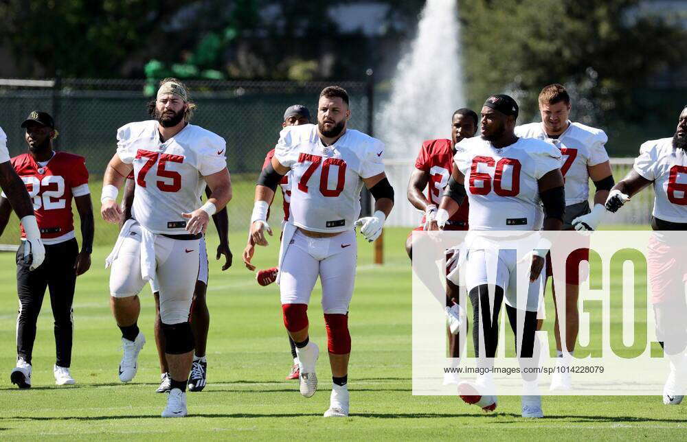 Tampa Bay Buccaneers guard John Molchon (75) walks off the field