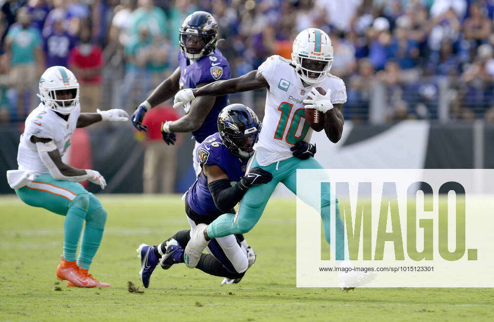 Baltimore, USA. 18th Sep, 2022. Miami Dolphins wide receiver Tyreek Hill  (10) is tackled by Baltimore Ravens safety Chuck Clark (36) during the  second half at M&T Bank Stadium in Baltimore, Maryland