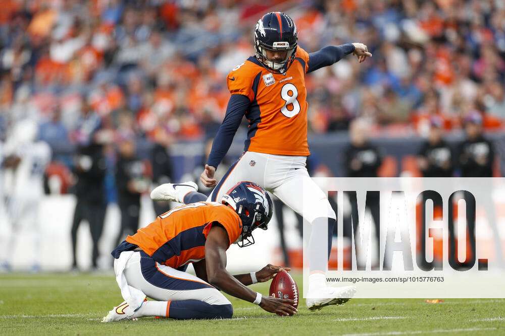 Denver Broncos place kicker Brandon McManus (8) kicks a field goal against  the Indianapolis Colts during