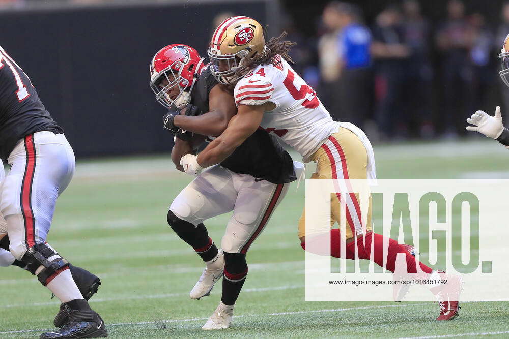 ATLANTA, GA - OCTOBER 16: San Francisco 49ers linebacker Fred Warner (54)  tackles Atlanta Falcons