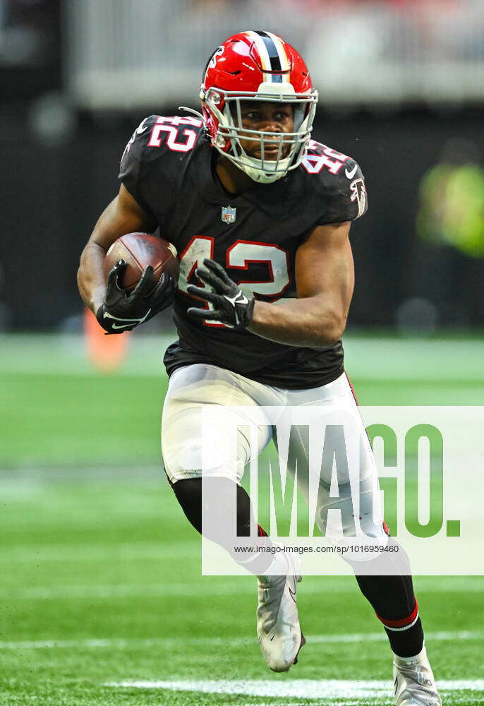 Atlanta Falcons running back Caleb Huntley (42) runs against the