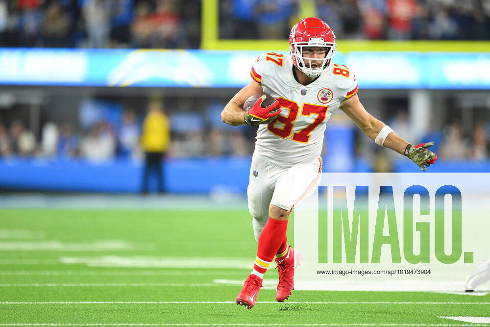 Inglewood, California, USA. 20th Nov, 2022. Kansas City Chiefs tight end  Travis Kelce #87 carries the ball during the NFL football game between the Kansas  City Chiefs and the Los Angeles Chargers