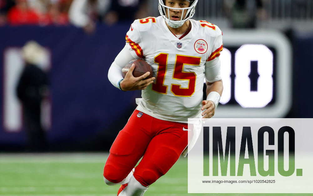 December 18, 2022: Kansas City Chiefs quarterback Patrick Mahomes (15)  carries the ball to set up a potential game-winning field goal near the end  of regulation in an NFL game between the