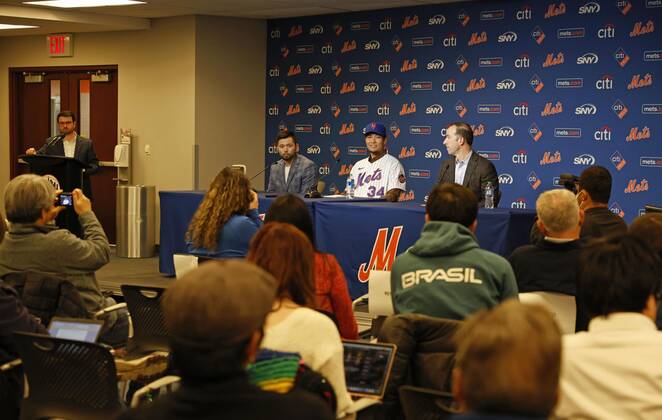 New York, US, Dec. 19, 2022, Japanese right-hander Kodai Senga is  surrounded by journalists after attending a press conference at the New  York Mets' home stadium Citi Field in New York on