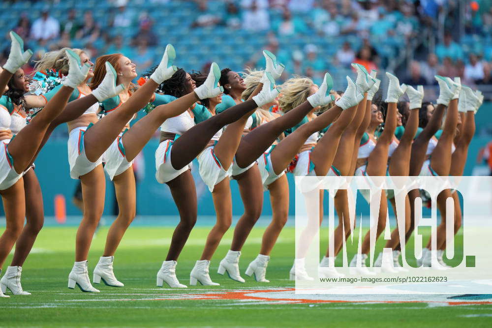 Miami Dolphins cheerleaders wearing Santa jackets perform on the field  during a NFL football game against the New York Jets, Sunday, Dec. 19,  2021, in Miami Gardens, Fla. (AP Photo/Doug Murray Stock