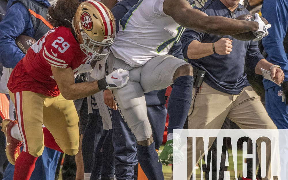 Santa Clara, California, USA. 14th Jan, 2023. San Francisco 49ers safety Talanoa  Hufanga (29) tackles Seattle Seahawks wide receiver DK Metcalf (14) on  Saturday, January 14, 2023, at Levis Stadium in Santa