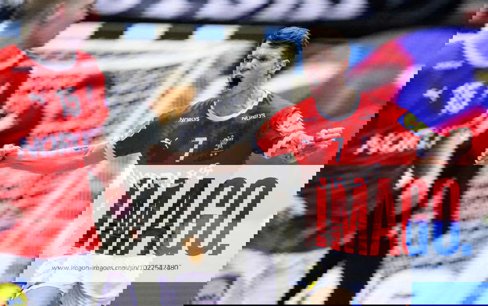 230119 Emil Jakobsen of Denmark celebrates during the 2023 IHF World