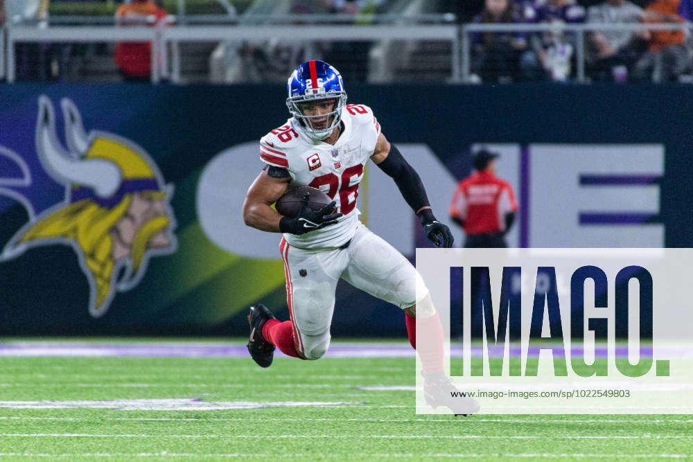 MINNEAPOLIS, MN - JANUARY 15: New York Giants running back Saquon Barkley  (26) runs with the ball during the NFL game between the New York Giants and  Minnesota Vikings on January 15th