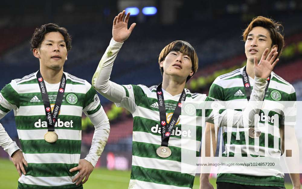 Glasgow, UK. 26th Feb, 2023. CelticÕs Japanese players Tomoki Iwata and  Yuki Kobayashi flank Kyogo Furuhashi after the The Scottish League Cup  match at Hampden Park, Glasgow. Picture credit should read: Neil