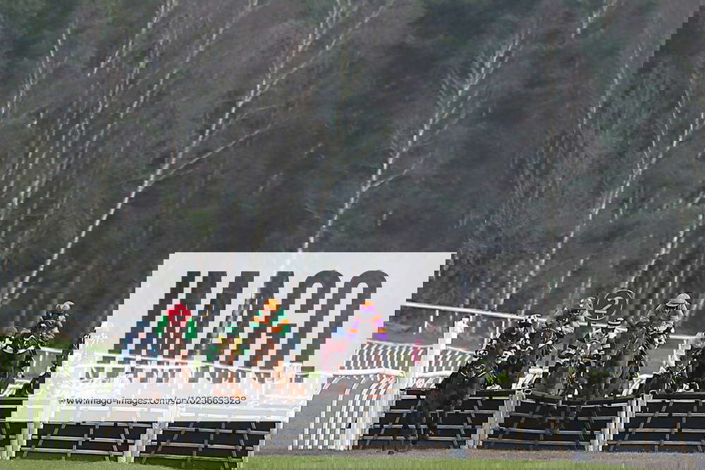 Horse Racing Market Rasen Meeting Horses jump the last fence during the horse race meeting at