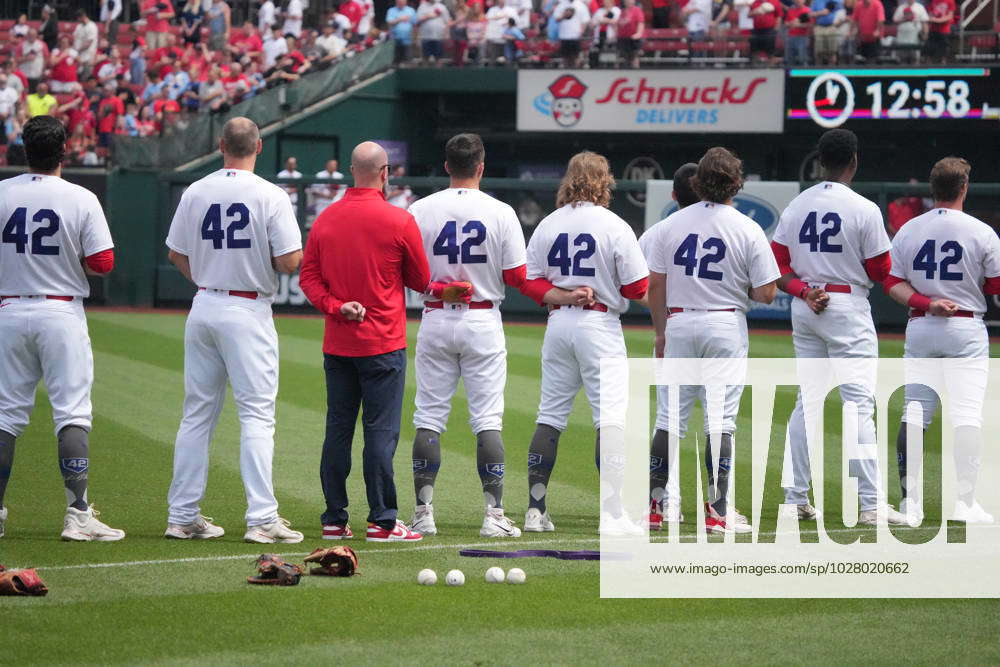 The St. Louis Cardinals line up during the national anthem wearing Jackie  Robinson's No. 42 jersey before action against the Milwaukee Brewers on  Wednesday, April 15, 2015, at Busch Stadium in St.