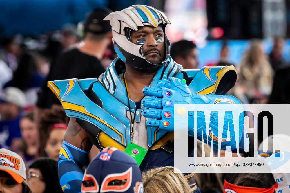 KANSAS CITY, MO - APRIL 27: A super fan of the LA Chargers displays his  gauntlet during