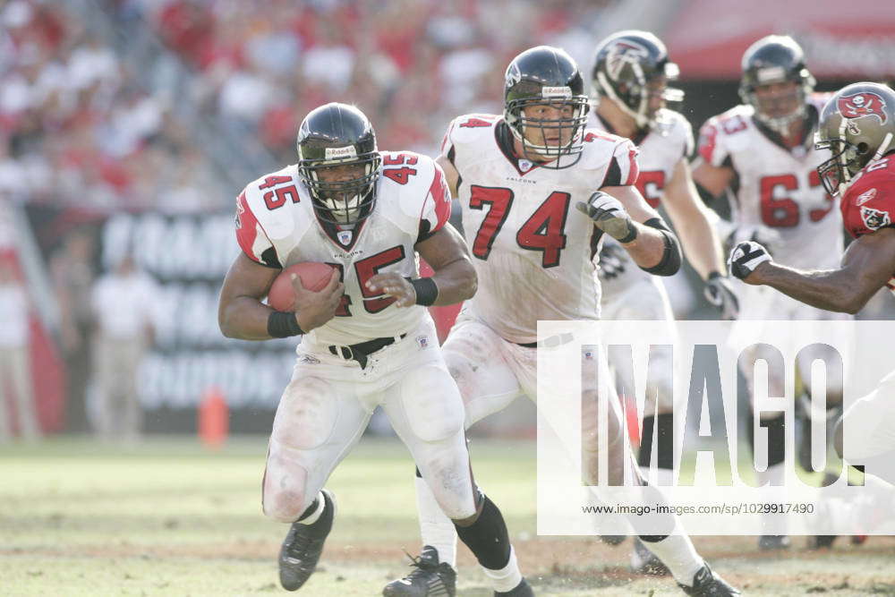 Atlanta Falcons running back T. J. Duckett (45) pushes past the