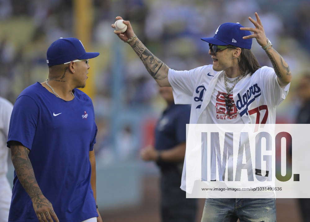 Peso Pluma throws first pitch to Julio Urias at Dodgers game