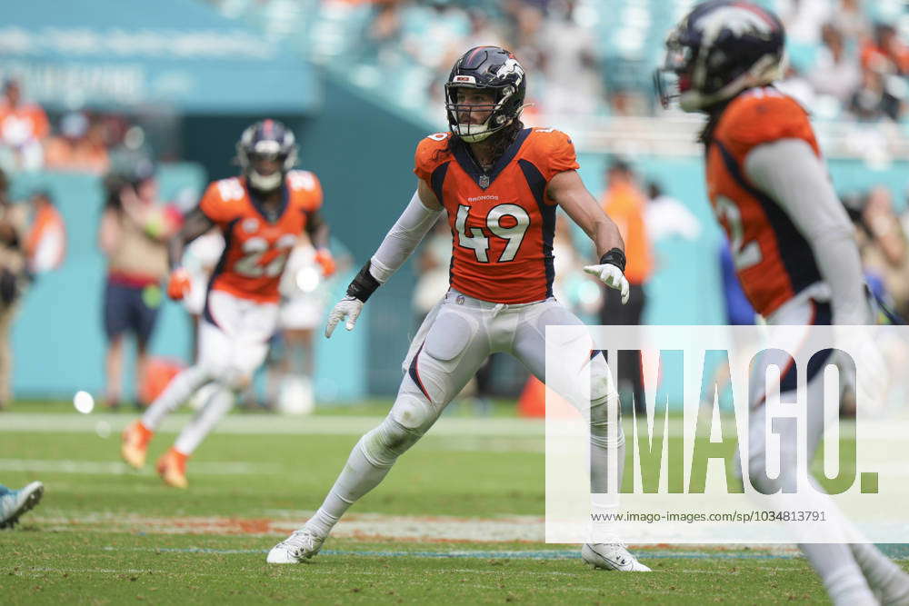 Miami Dolphins running back Chris Brooks runs with the ball on the