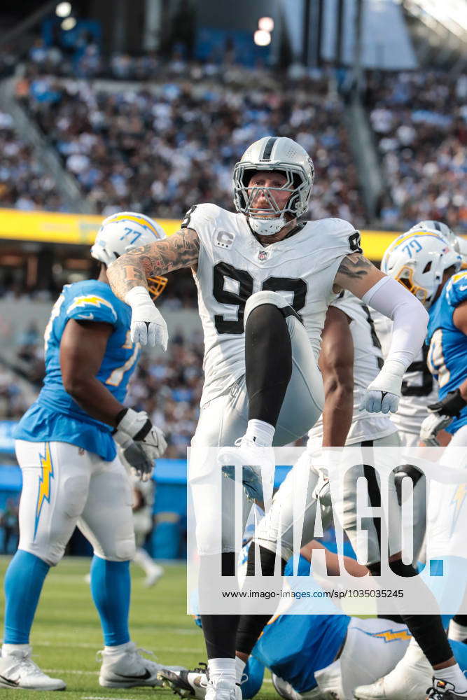 Raiders defensive end Maxx Crosby (98) celebrates a sack of