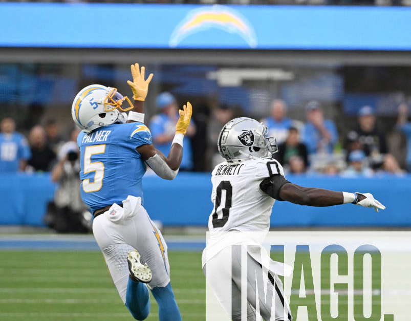 Photo: Chargers Josh Palmer Catches a 51 yard Pass by Raiders Jakorian  Bennett at SoFi Stadium - LAP20231001807 