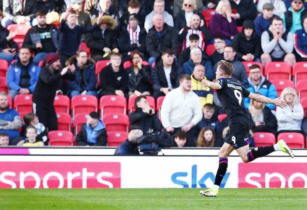 Bojan Radulovic of Huddersfield Town celebrates scoring the opening goal  Stoke City v Huddersfield