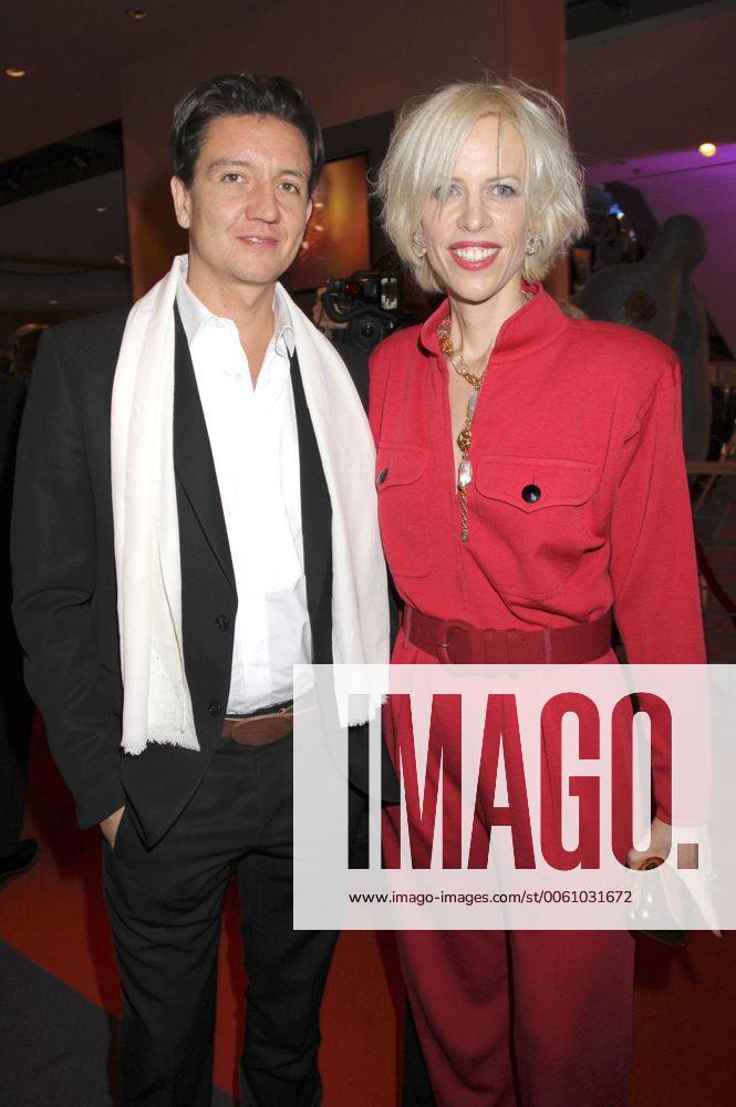Anthony James and Katja Eichinger during the opening party at the 64th