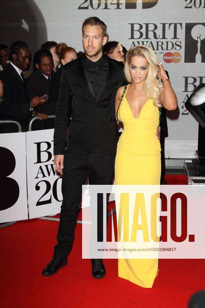 The BRIT Awards With MasterCard Red Carpet London UK Calvin Harris And Rita Ora At The The BR