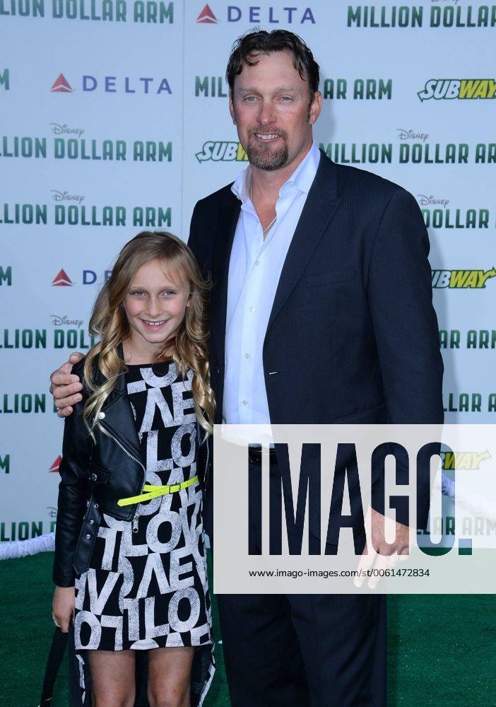 MLB player Mark Kotsay and his daughter Sienna attend the premiere of
