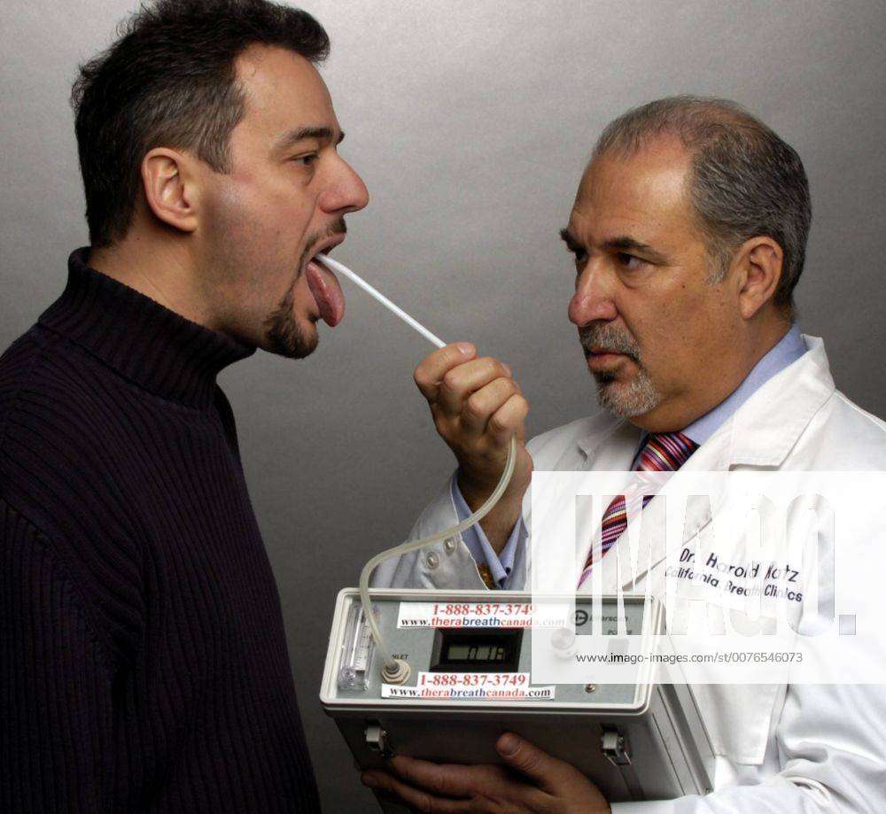 Jan 19, 2006; Toronto, Ontario, CANADA; Dr. Harold Katz of California tests  the breath of Mladen